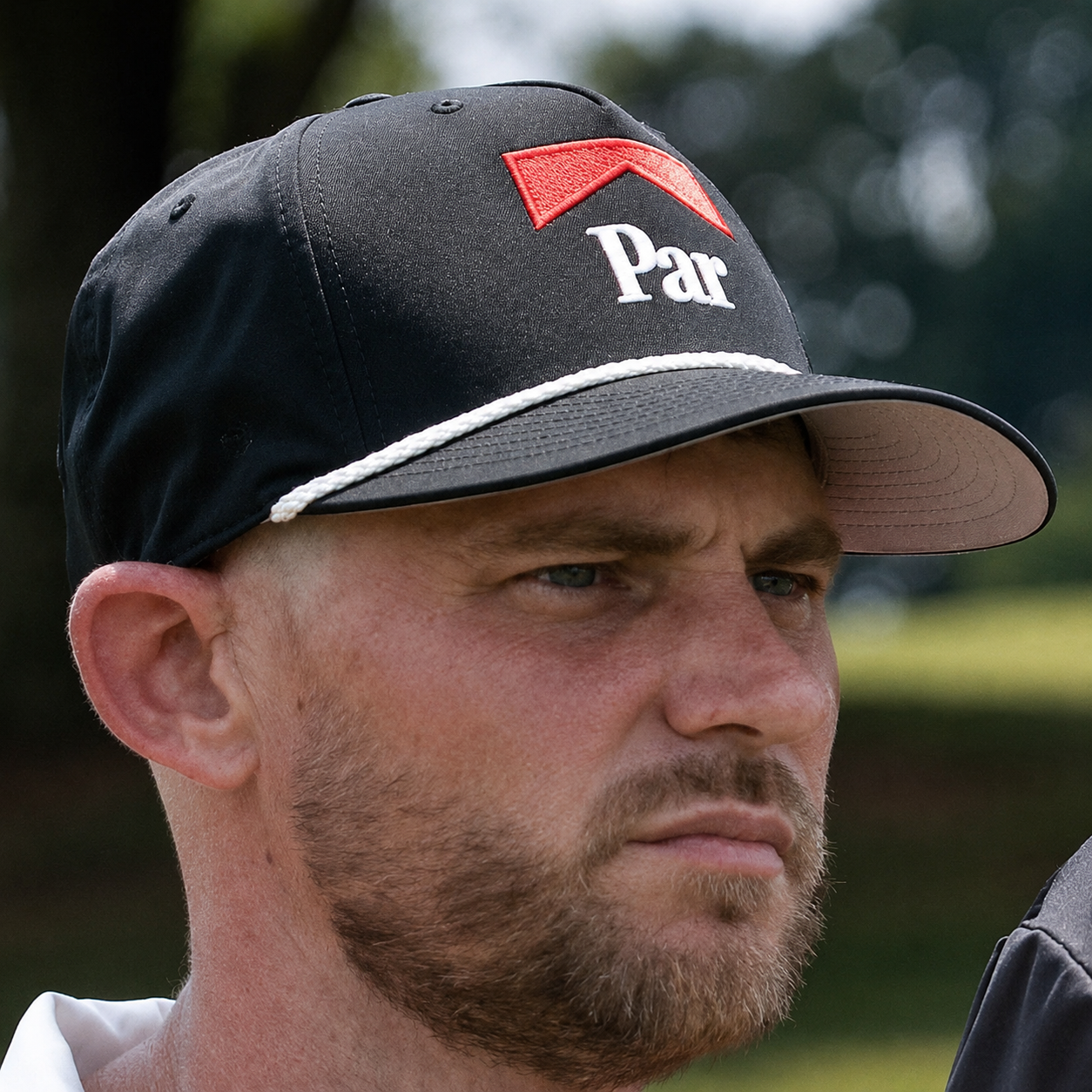 A stylish Parboro golf rope hat from Not Bad Pretty Good featuring a woven design and adjustable strap, perfect for outdoor golf wear.
