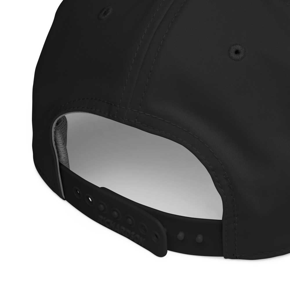 Black and white inverted golf hat with classic rope detail by Not Bad Pretty Good, shown from a front angle.