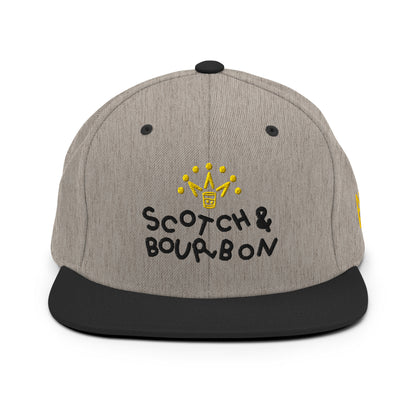 Heather black Scotch & Bourbon golf snapback hat by Not Bad Pretty Good with front logo and adjustable strap.